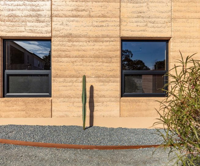 earth home exterior with cactus